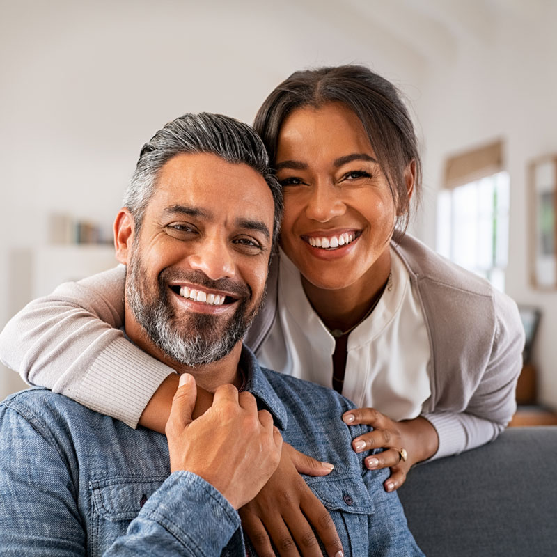 elderly couple smiling